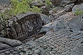 Kbal Spean, the river of the Thousand Lingam, carved on the riverbed the famous reclining Vishnu recently restored after it has been defaced by vandals 